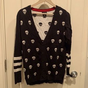 Wet Seal black cardigan with skull details.